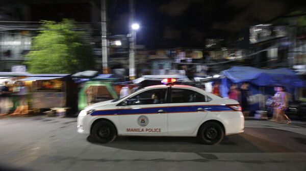 Машина полиции на улице Манилы, Филиппины