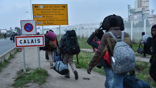 Эвакуация лагеря мигрантов в Кале, Франция