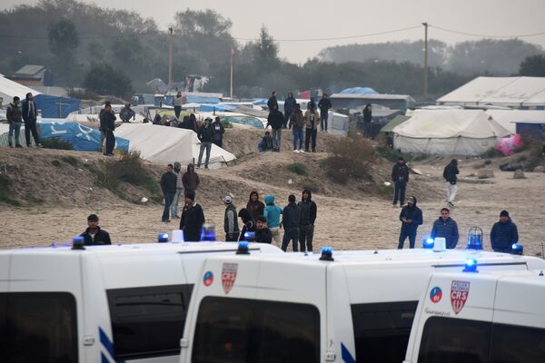 Эвакуация лагеря мигрантов в Кале, Франция