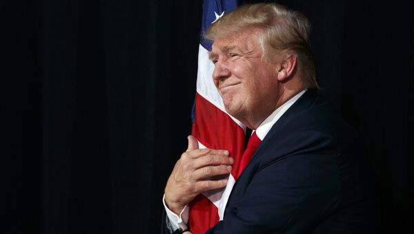 Кандидат в президенты США Дональд Трамп во время предвыборной кампании в городе Тампа штата Флорида. 24 октября 2016 года