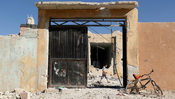 Последствия авиаудара в сирийской провинции Идлиб