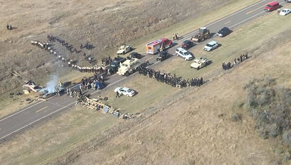 Разгон лагеря активистов, выступающих против строительства трубопровода в Северной Дакоте, США. Архивное фото