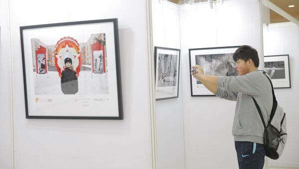 Выставка победителей Международного конкурса фотожурналистики им. Андрея Стенина в Шанхае. Архивное фото