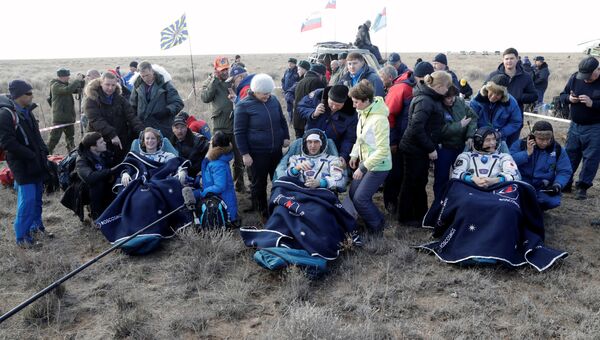 Члены экипажа МКС Анатолий Иванишин, Такуя Ониши и Кэйтлин Рубинс вернулись на землю. Архивное фото