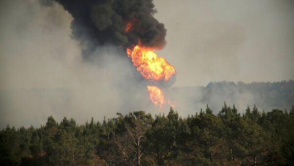 Пожар на месте взрыва трубопровода Colonial Pipeline в округе Шелби, штат Алабама