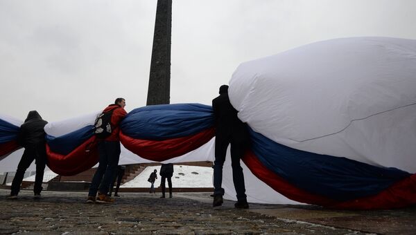 Церемония демонстрации самого большого флага Российской Федерации в Москве. Архивное фото