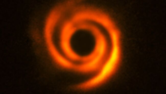 Протопланетный диск и следы столкновения планет у звезды HD 135344B