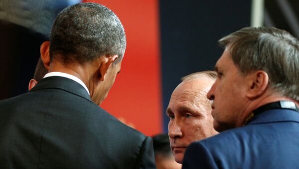 Российский президент Владимир Путин и американский лидер Барак Обама на саммите АТЭС в Перу