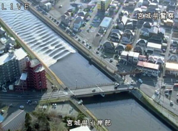 Волнение, вызванное землетрясением, на реке Сунаёси, Япония