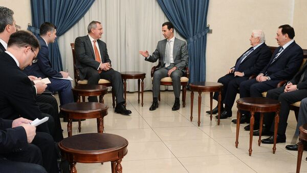 Заместитель председателя правительства РФ Дмитрий Рогозин и президент Сирии Башар Асад во время встречи в Дамаске