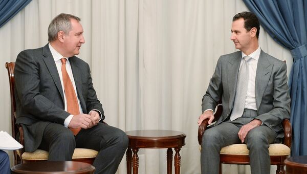 Заместитель председателя правительства РФ Дмитрий Рогозин и президент Сирии Башар Асад во время встречи в Дамаске