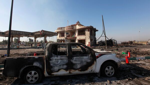 Место взрыва на АЗС близ Багдада. 25 ноября 2016