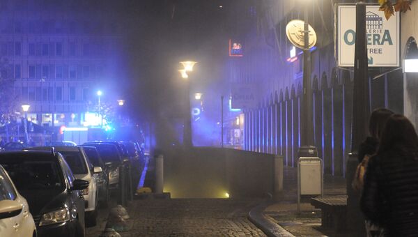 Дым на улице бельгийского Льеже после взрыва автомобиля. 27 ноября 2016 год