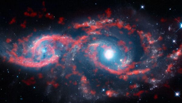 Галактики IC 2163 и NGC 2207, превратившаяся в своеобразную пару глаз в результате космического ДТП