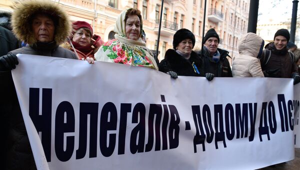 Митинг против принятия квоты на расселение мигрантов на Украине у здания Министерства юстиции в Киеве. 30 ноября 2016