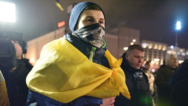 Участник акции по случаю третьей годовщины событий на киевском Майдане. Архивное фото