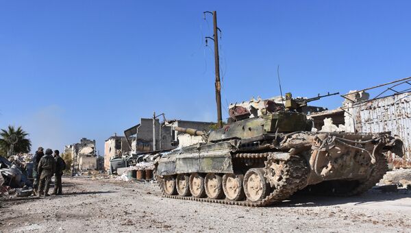 Военные сирийской армии в одном из восточных районов Алеппо. Архивное фото