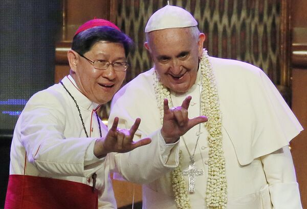 Папа римский Франциск и архиепископ Манилы, кардинал Луис Антонио Тагле