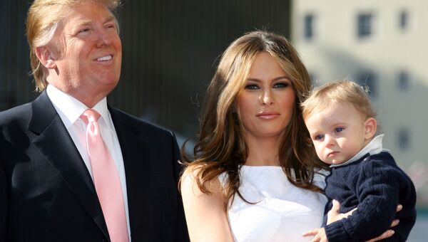 Дональд Трамп, его жена Меланья и сын