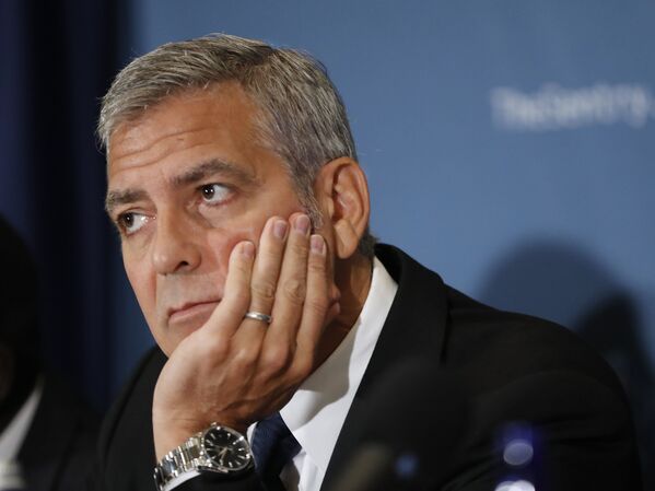 Американский актер Джордж Клуни во время пресс-конференции в Вашингтоне. 12 сентября 2016 года