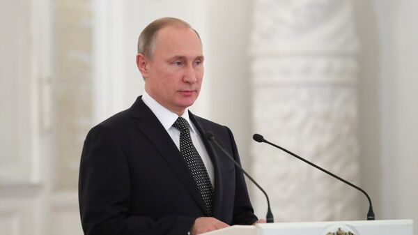 Президент РФ Владимир Путин во время ежегодного торжественного приёма в Кремле по случаю празднования Дня Героев Отечества. 9 декабря 2016