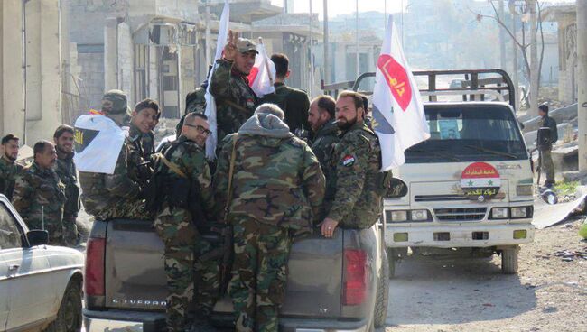 Сирийские военнослужащие в восточном Алеппо