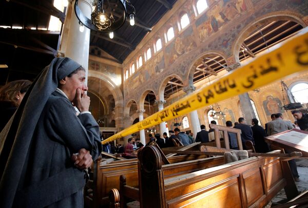 Последствия взрыва в коптской церкви в Каире