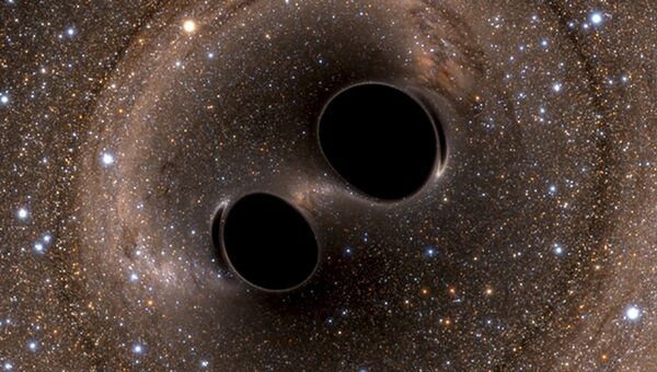 Кадр моделирования столкновения двух черных дыр в космосе