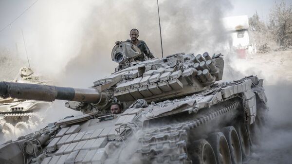 Военнослужащие сирийской армии в пригороде Дамаска Джоббар, где идут бои с мятежниками