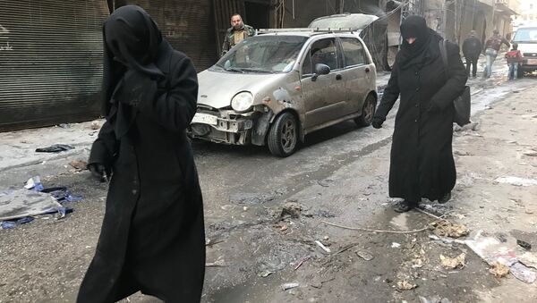 Жители Алеппо возвращаются в освобожденных кварталы города