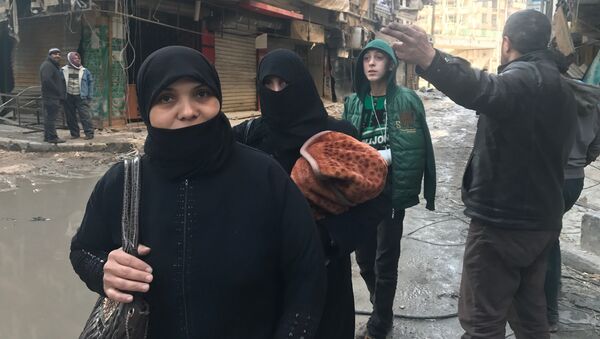 Жители Алеппо возвращаются в освобожденные от боевиков восточные кварталы города