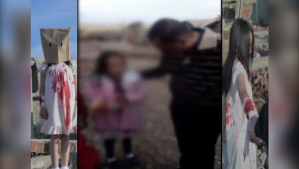Девочка в окровавленном платье позировала для фотографий из Алеппо