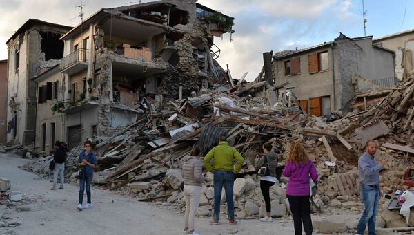 Дома, разрушенные в результате землетрясения в городе Аматриче в Италии. Архивное фото