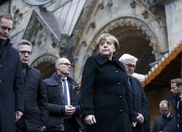 Канцлер Германии Ангела Меркель на месте трагедии в Берлине. 20 декабря 2016