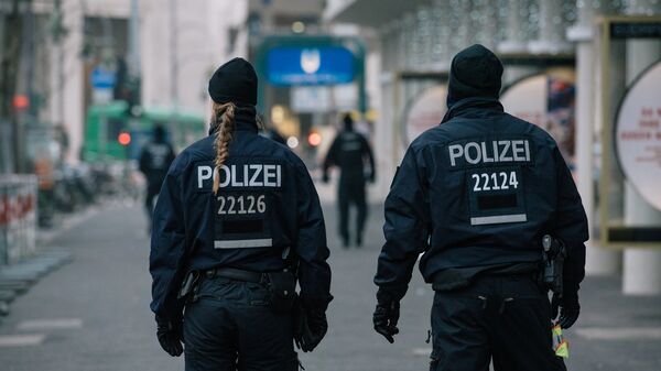 Сотрудники полиции недалеко от места теракта в Берлине. Архивное фото