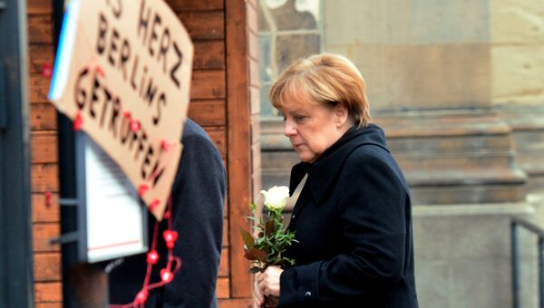 Канцлер Германии Ангела Меркель на месте теракта в Берлине. 20 декабря 2016