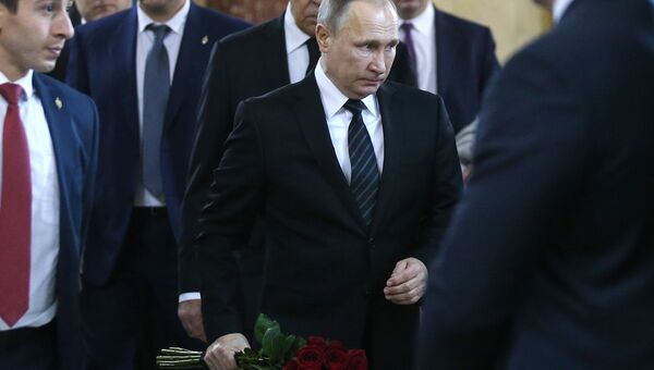 Президент РФ Владимир Путин на церемонии прощания с российским послом в Турции Андреем Карловым. 22 декабря 2016