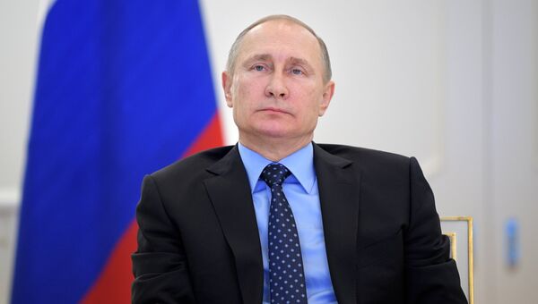 Президент РФ Владимир Путин на церемонии пуска подачи газа в Крым из материковой России в режиме видеоконференции в Кремле. 27 декабря 2016