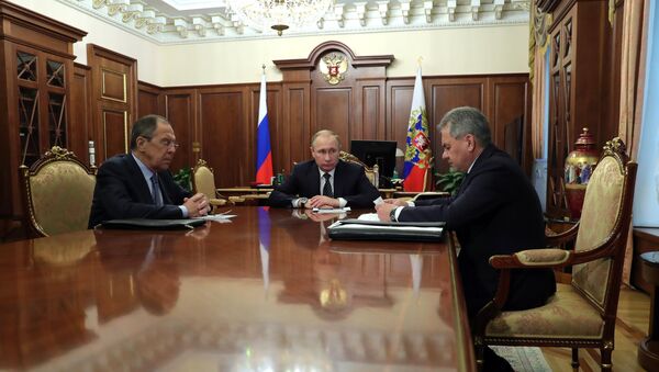 Владимир Путин, Сергей Шойгу и Сергей Лавров во время встречи в Кремле. 29 декабря 2016