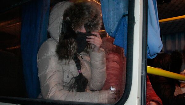 Возвращенные украинскими военными пленные ДНР и ЛНР в автобусе на окраине Горловки Донецкой области