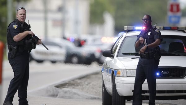 Полицейские на месте стрельбы в аэропорту в Форте-Лодердейле в штате Флорида