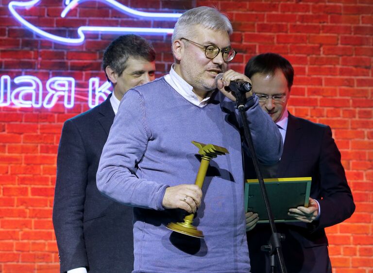 Писатель Евгений Водолазкин (на первом плане), получивший второе место за роман Авиаторна церемонии вручения Национальной литературной премии Большая книга