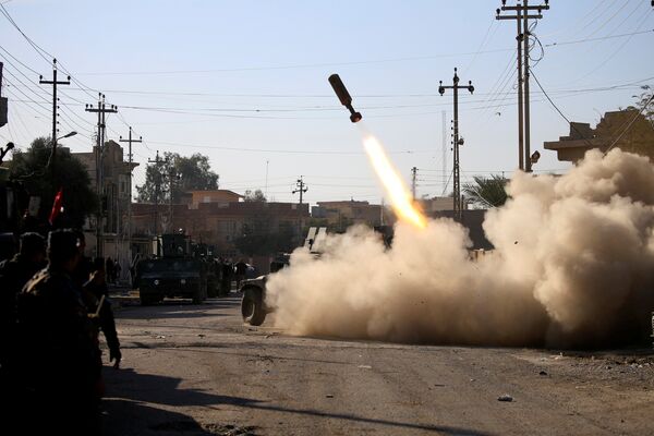 Иракские военные бедут бой в восточной части Мосула