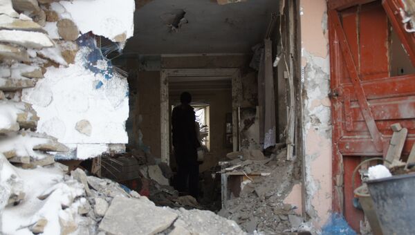 Последствия артобстрела украинскими силовиками городе Дебальцево. Архивное фото