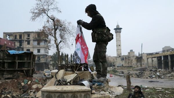 Военнослужащие в освобожденном квартале восточного Алеппо. Сирия, 13.12.2016