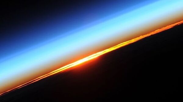 Рассвет на орбите снятый космонавтом Роскосмоса Олегом Новицким