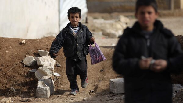 Сирийские дети вернулись в школу в освобожденном городе Аль-Раи на севере Алеппо