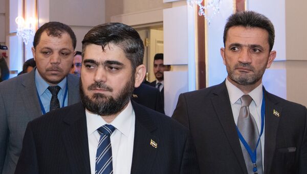 Глава делегации сирийской оппозиции Мухаммед Аллуш из группировки Джейш аль-Ислам перед началом встречи по Сирии в Астане. 23 января 2017. Архивное фото