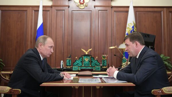 Президент РФ Владимир Путин и губернатор Свердловской области Евгений Куйвашев во время встречи. 24 января 2017