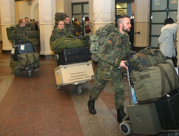 Военнослужащие вооруженных сил Германии в аэропорту Вильнюса, Литва. 24 января 2017 Военнослужащие вооруженных сил Германии в аэропорту Вильнюса, Литва. 24 января 2017